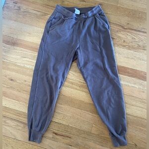 Purple Nike Yoga Dri-Fit Joggers.
